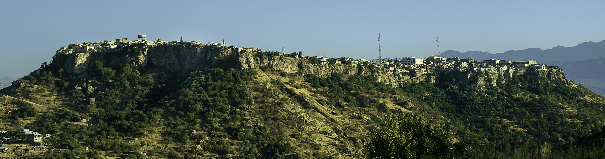 The town of Amedi on its flat mountain top with the ranges of Duhok behind it